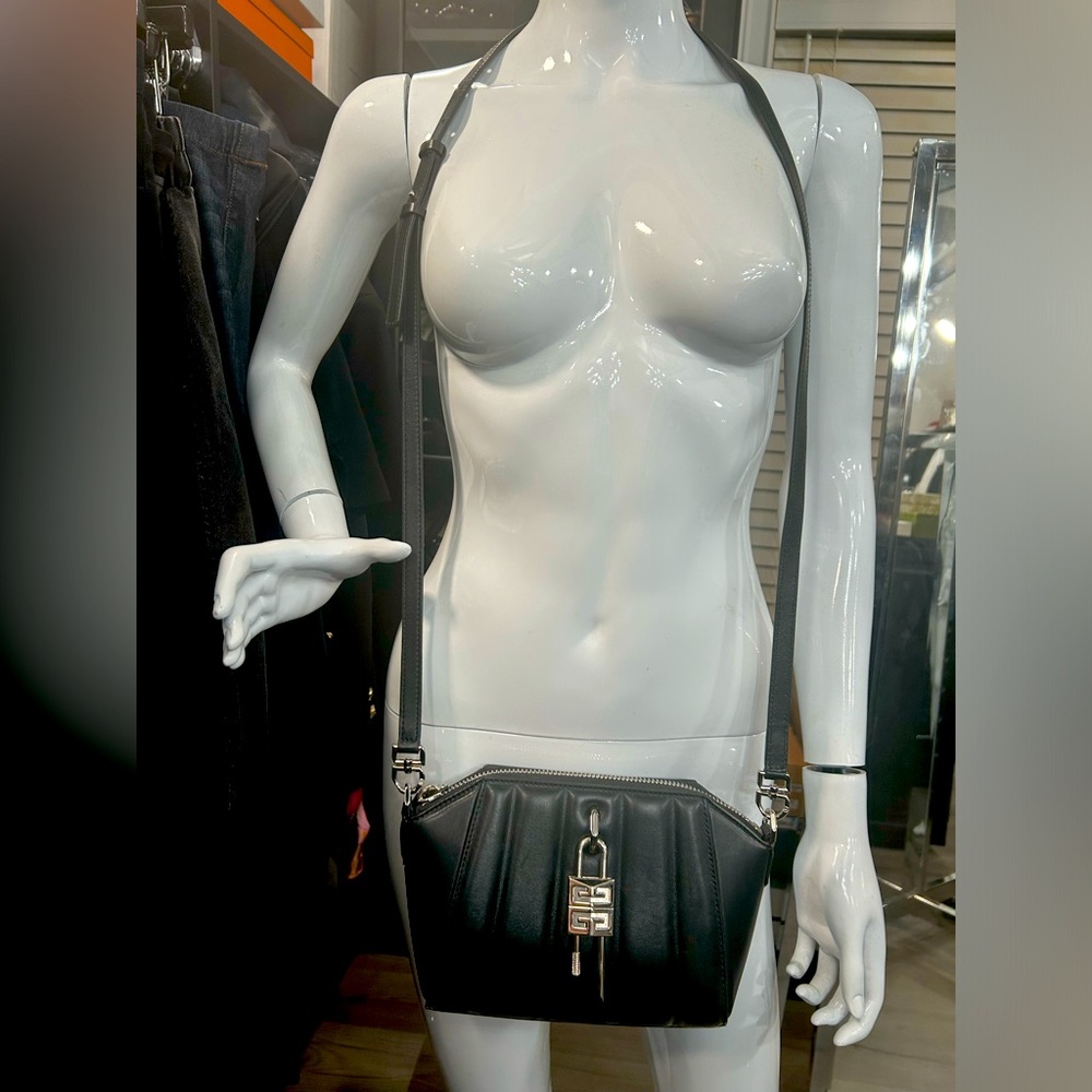 I am selling a small black authentic Givenchy Antigona crossbody bag in exc cond